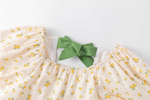 Vestido marfil flores mostaza lazo verde - Imagen 2